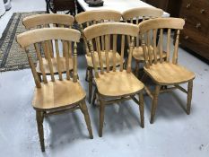 A set of six pine kitchen chairs