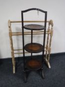 An oak folding cake stand and a pine towel rail