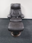 A Lazyboy brown leather reclining armchair with stool