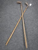 Two vintage hickory shafted Mashie Niblick golf clubs