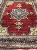 A Saroukh carpet, West Persia, the strawberry field with central floral anchor medallion,