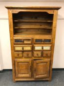 A Barker & Stonehouse oak kitchen cabinet fitted with drawers,