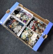 A box containing a quantity of costume jewellery