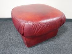A leather footstool