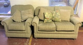 A two seater settee and armchair with loose cushions