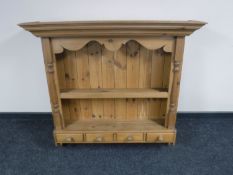 A pine Delft plate rack fitted four drawers