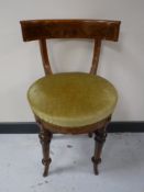 An early twentieth century walnut dressing table chair