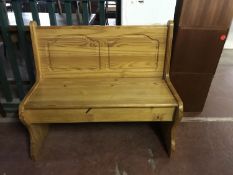 A pine storage bench