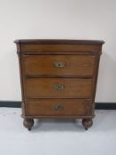 A late nineteenth century mahogany three drawer chest