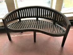 A plantation teak garden bench