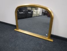 A gilt framed over mantel mirror