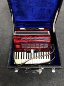 A cased Baile accordion