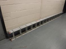 A double aluminium extension ladder with rest