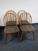 A set of four Ercol elm dining chairs