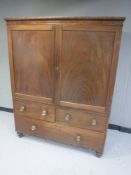A Regency mahogany linen press fitted three drawers beneath (converted to a wardrobe)