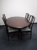 A six piece Stag Minstrel dining room suite
