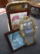 A box of assorted pictures and prints