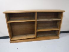 A set of twentieth century oak open bookshelves