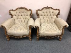A pair of continental style walnut salon chairs upholstered in two-tone green silk (2)