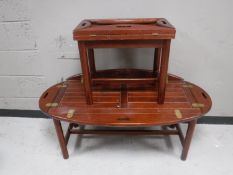 A mahogany butlers coffee table,