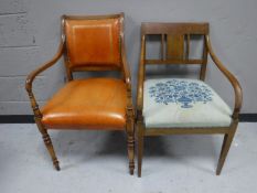 A mahogany framed button leather upholstered scroll arm armchair,