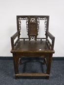 A Chinese elm armchair