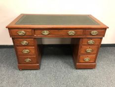 A late Victorian mahogany pedestal desk,