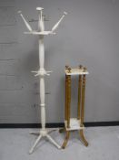 A gilt wood and marble two tier plant stand,