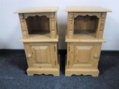 A pair of pine bedside cabinets