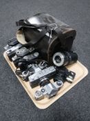 A tray of eight vintage cameras - Pentax, Canon,