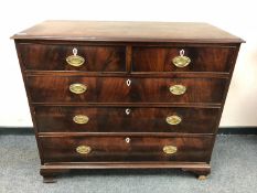 A George III mahogany five drawer chest on bracket feet,