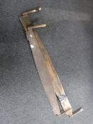 Two vintage cross cut saws