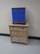 A miniature stripped pine three drawer chest,