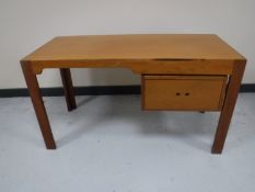 A mid 20th century Danish teak desk fitted one drawer