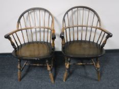 A pair of 20th century Windsor style armchairs