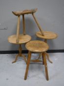 An antique pine milking stool,