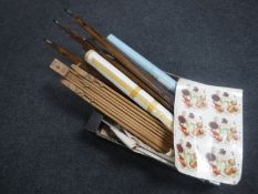 A box of two artists easels, quantity of unframed pictures,