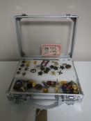 A display case of military buttons and badges