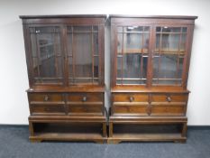 A pair of late Victorian mahogany bookcases fitted with dummy drawers