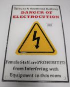 A cast iron electrocution railway sign
