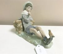 A Lladro figurine : Bird Watcher, model 4730, height 16 cm, boxed.