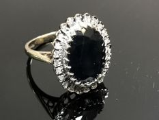 A 9ct gold CZ and synthetic sapphire dress ring,