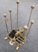 A cast iron horse head boot holder and brush