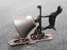 A cast iron standing Labrador bell