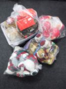 A box and three bags containing Christmas teddy bears and soft toys