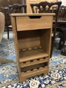 An oak wine bottle rack,
