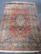 A machine made Isfahan design rug