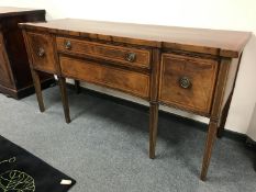 A nineteenth century inlaid mahogany sideboard,