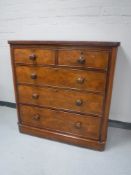A Victorian mahogany five drawer chest