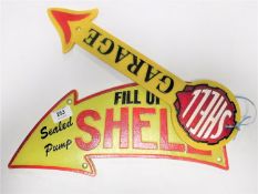 Two cast iron Shell Arrow garage signs